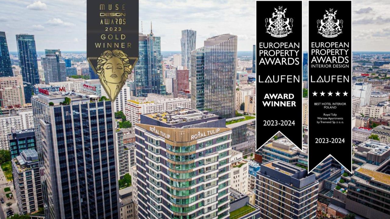 Aparthotel Royal Tulip Warsaw Centre Exterior foto The image showcases a city skyline featuring modern high-rise buildings. Prominently displayed are awards indicating recognition for excellence in design and property management. These include a gold award from the "MUSE Design Awards 2023" and a win